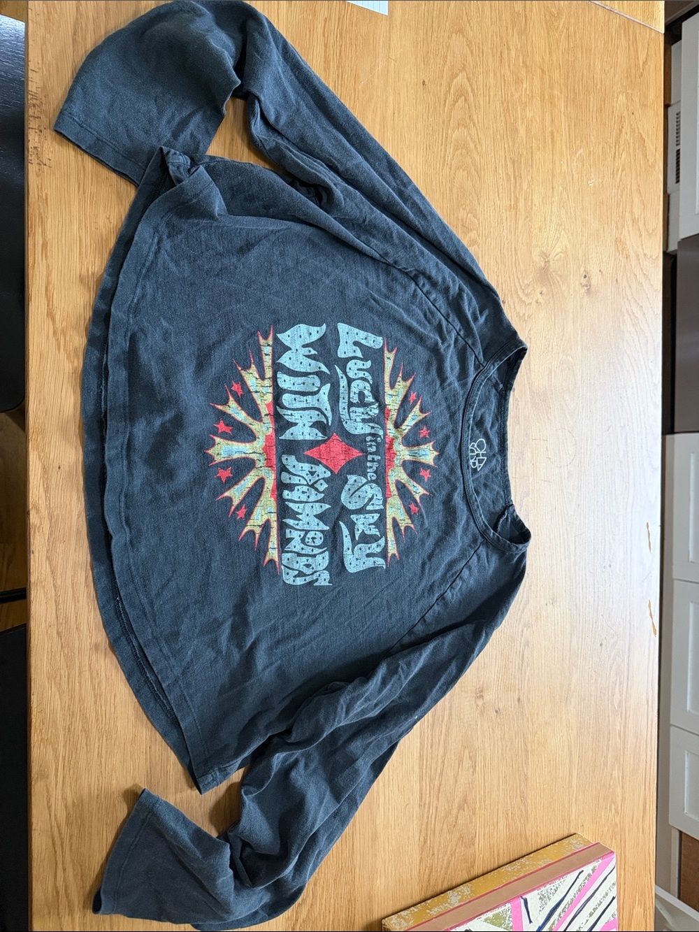 Chaser Black Long Sleeve Graphic Tee with Red and Yellow Accents